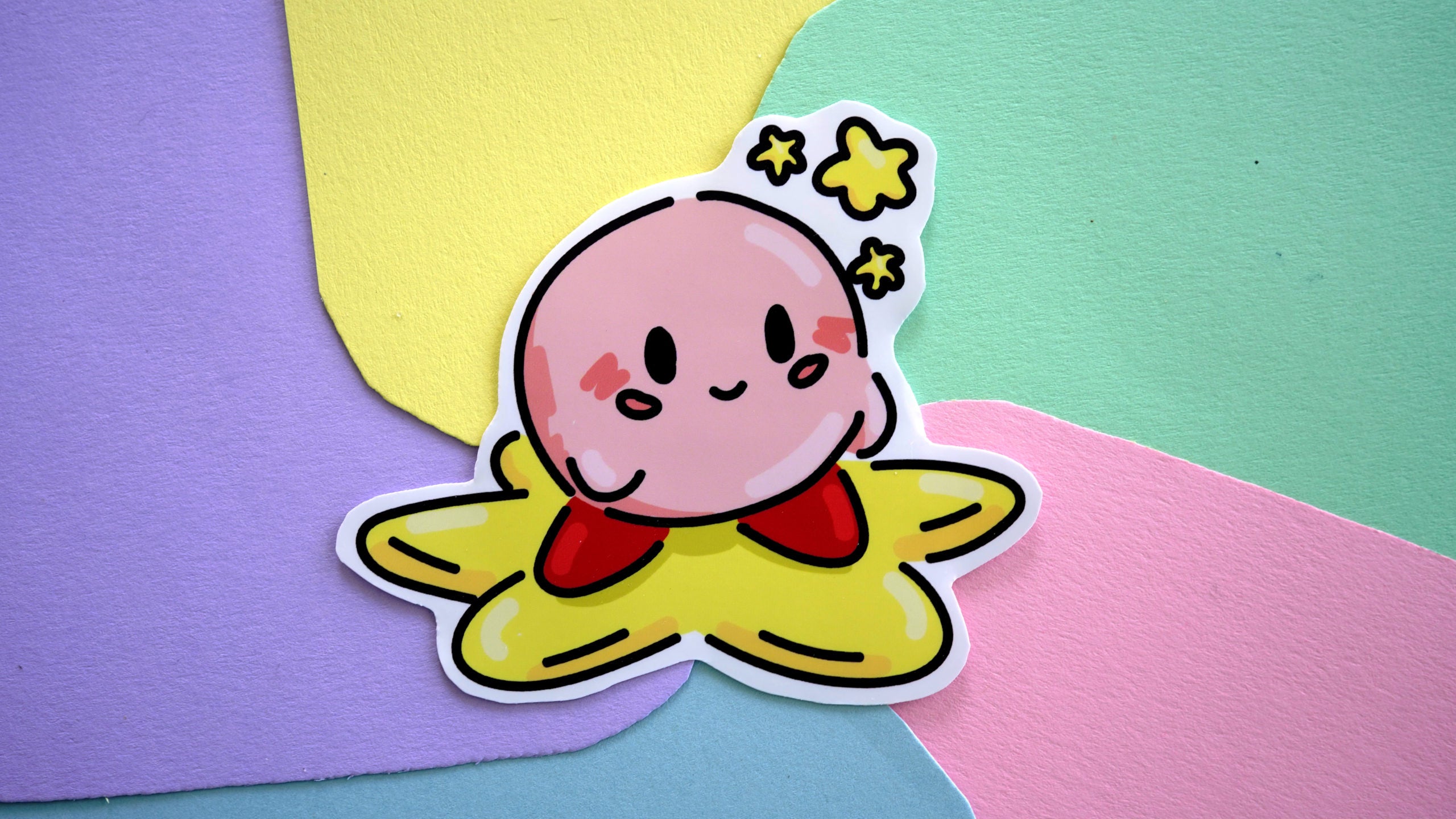 Kirby On A Star Sticker image 0
